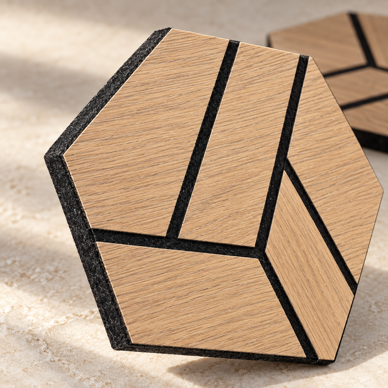Close-up of Feltova wood-grain PET felt wall panel surface and edge detail