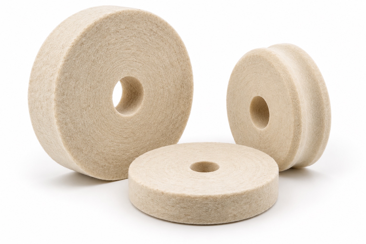 Illustrative white-background concept of custom felt polishing wheels