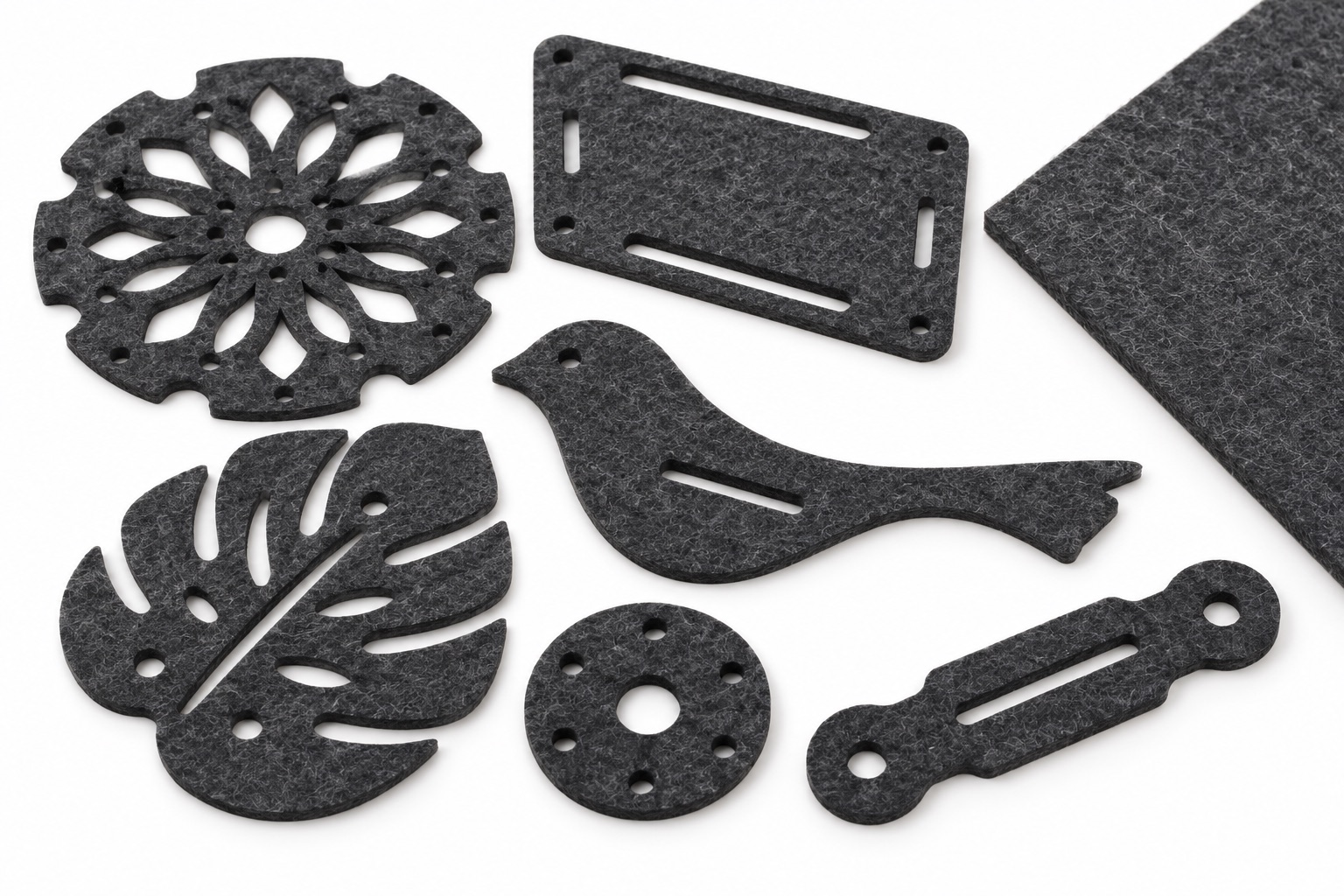 Illustrative white-background concept of laser-cut felt parts